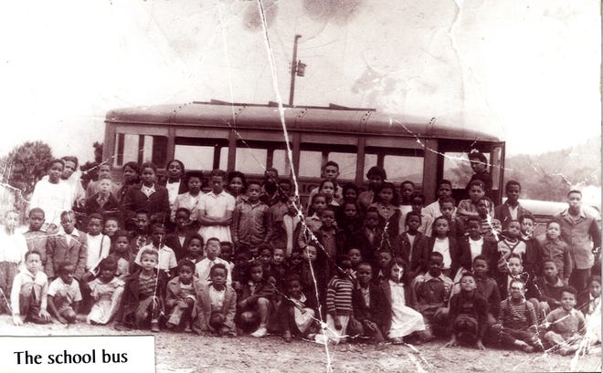 A group of students on a school bus in 1945 traveled from Black Mountain to Asheville for education.