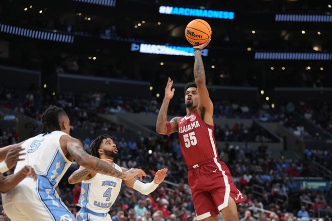Mar 28, 2024; Los Angeles, CA, USA; Alabama Crimson Tide guard Aaron Estrada (55) shoots against North Carolina Tar Heels guard RJ Davis (4) in the first half in the semifinals of the West Regional of the 2024 NCAA Tournament at Crypto.com Arena. Mandatory Credit: Kirby Lee-USA TODAY Sports