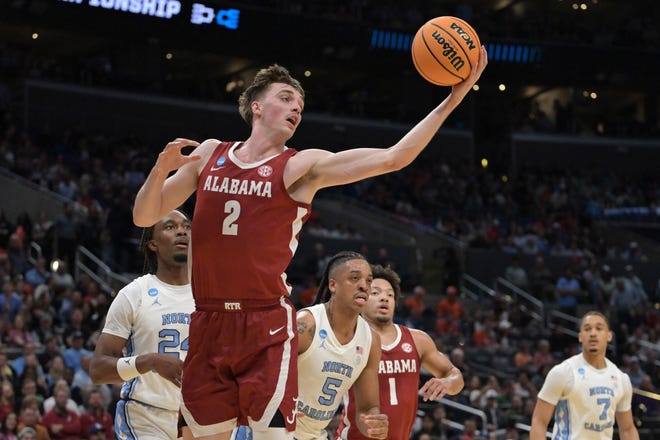 Mar 28, 2024; Los Angeles, CA, USA; Alabama Crimson Tide forward Grant Nelson (2) grabs a rebound in the first half against the North Carolina Tar Heels in the semifinals of the West Regional of the 2024 NCAA Tournament at Crypto.com Arena. Mandatory Credit: Jayne Kamin-Oncea-USA TODAY Sports