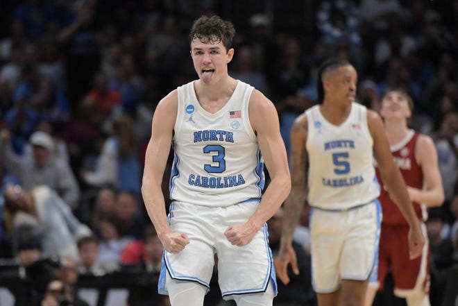 Mar 28, 2024; Los Angeles, CA, USA; North Carolina Tar Heels guard Cormac Ryan (3) reacts in the first half against the Alabama Crimson Tide in the semifinals of the West Regional of the 2024 NCAA Tournament at Crypto.com Arena. Mandatory Credit: Jayne Kamin-Oncea-USA TODAY Sports
