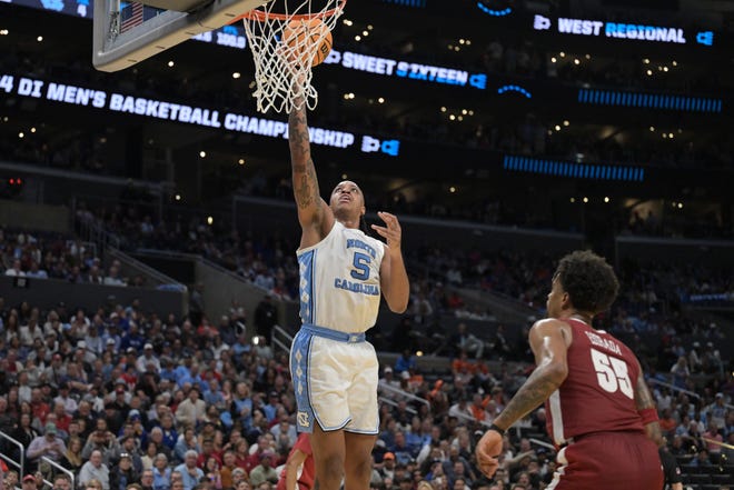 Mar 28, 2024; Los Angeles, CA, USA; North Carolina Tar Heels forward Armando Bacot (5) shoots against the Alabama Crimson Tide in the first half in the semifinals of the West Regional of the 2024 NCAA Tournament at Crypto.com Arena. Mandatory Credit: Jayne Kamin-Oncea-USA TODAY Sports
