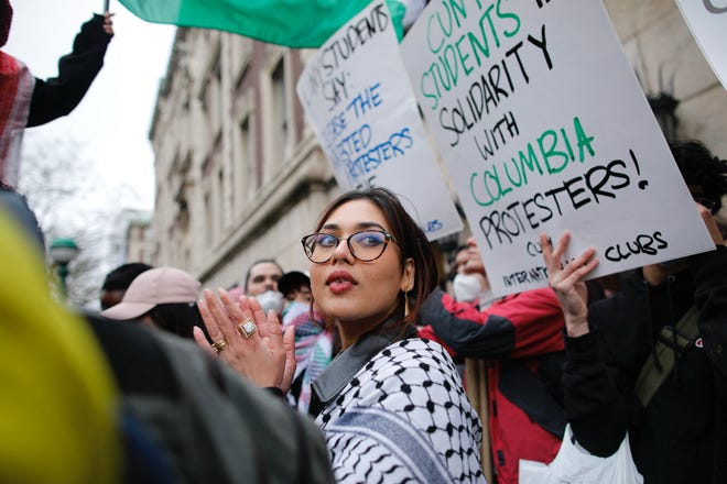 Pro-Palestinian protesters gather outside of Columbia University in New York City on April 18, 2024. Officers cleared out a pro-Palestinian campus demonstration on April 18, a day after university officials testified about anti-Semitism before Congress. Leaders of Columbia University defended the prestigious New York school's efforts to combat anti-Semitism on campus at a fiery congressional hearing on April 17.