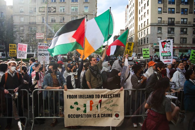 Pro-Palestinian activist protest outside Columbia University in New York City on April 20, 2024.