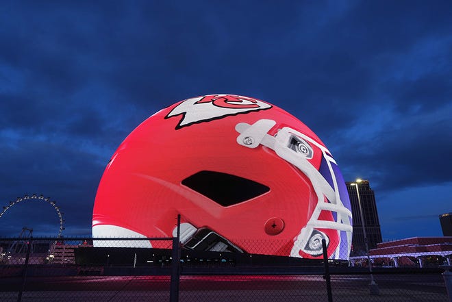 A Kansas City Chiefs helmet is projected onto the Sphere, Feb. 10, 2024.