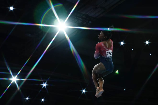 Oct. 8: Simone Biles performs on the floor during the women's team final.