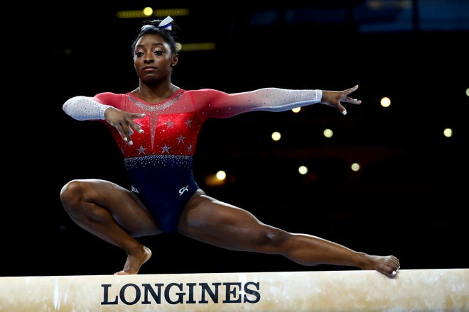 Oct. 8: Simone Biles performs on the balance beam during women's team final at the Gymnastics World Championships in Stuttgart, Germany.