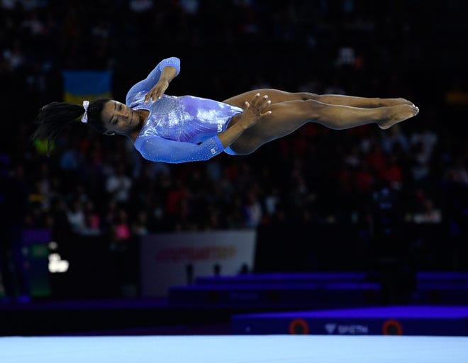 USA's Simone Biles performs on the floor during the apparatus finals.