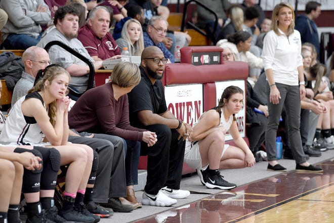 Owen girls basketball coach Anderson Bynum watches his team on the court during their game against North Buncombe at Owen High School on Jan. 2, 2020.