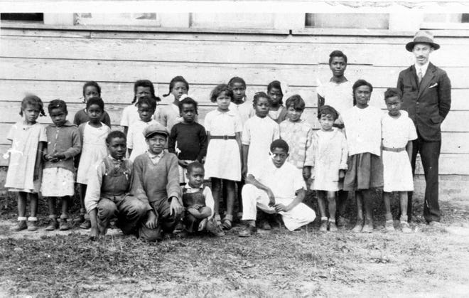 By 1928, one-third of the South’s rural Black school children and teachers were served by Rosenwald Schools. One of these schools was in Swannanoa. This photograph shows the school and some of its students in the 1930s.