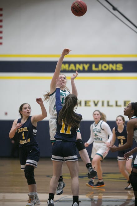 Asheville Christian Academy's Chloe Schneider shoots in ACA's playoff game against Carmel Christian on Feb. 15, 2020, at ACA in Swannanoa. ACA took the win with a final score of 66-40.
