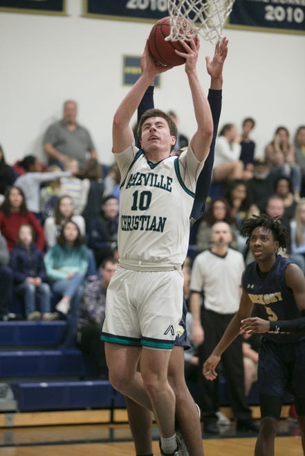 Asheville Christian Academy plays Hickory Grove Christian in playoff action on Feb. 15, 2020, at ACA in Swannanoa. ACA moves to the semifinal round after winning 71-69.