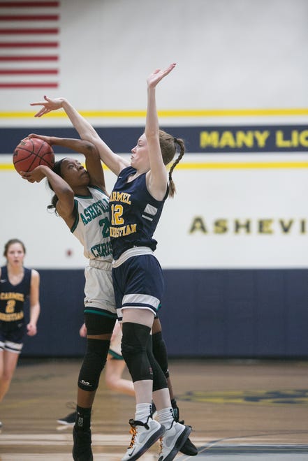 Asheville Christian Academy's Nahndi Smith goes up for a basket in ACA's quarterfinal playoff game against Carmel Christian on Feb. 15, 2020, at ACA in Swannanoa.  ACA took the win with a final score of 66-40.