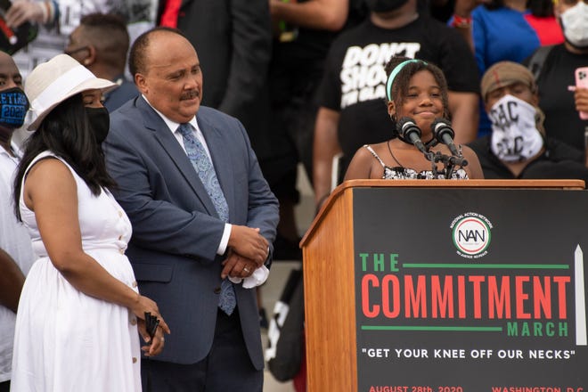 Martin Luther King III and his wife Arndrea Waters watch as their daughter Yolanda Renee King, the first and only grandchild of Martin Luther King, delivers remarks as people gather at the 'Get Off Our Necks' Commitment March on Washington on August, 28, 2020.