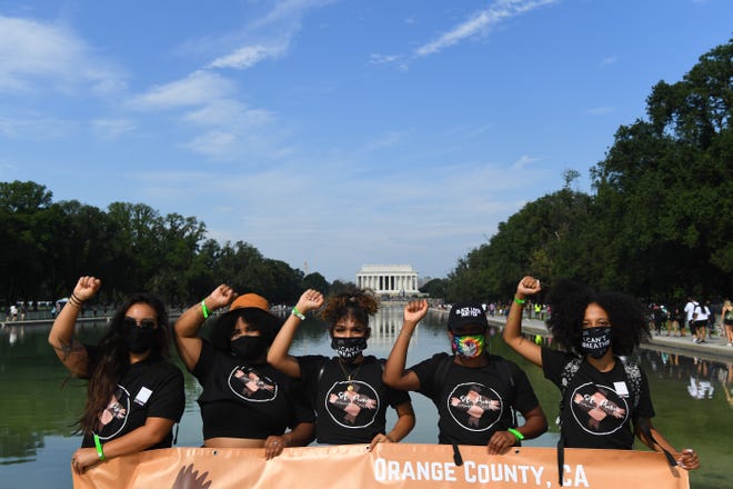People gather at the 'Get Off Our Necks' Commitment March on Washington on August, 28, 2020.