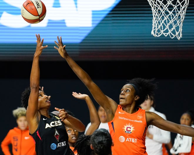 Semifinals: Las Vegas Aces forward Angel McCoughtry  looks to shoot as Connecticut Sun forward Beatrice Mompremier defends during Game 2.