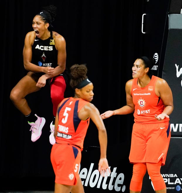 Semifinals: Las Vegas Aces center A'ja Wilson (left) and Connecticut Sun guard Jasmine Thomas react during Game 2. The Aces won the game, 83-75, to even up the series at a game apiece.