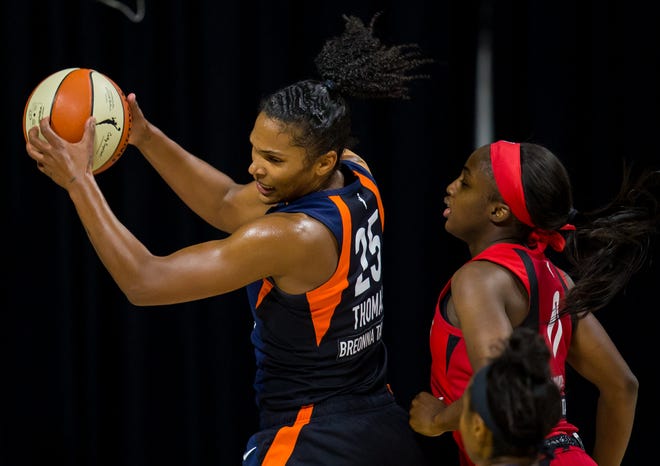 Semifinals: Connecticut Sun forward Alyssa Thomas (25) rebounds against Las Vegas Aces guard Jackie Young. Thomas had 12 rebounds in the Sun's 77-68 win in Game 3.