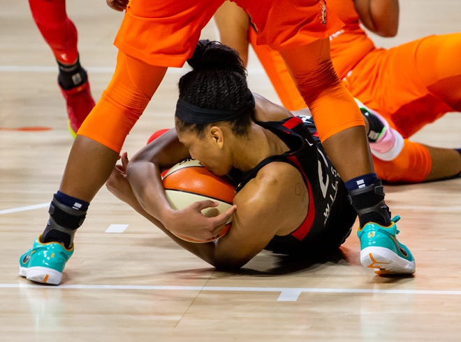 Semifinals: Aces center A'ja Wilson corrals a loose ball during Game 5 against the Sun.