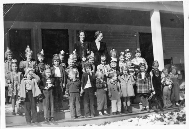 Teachers of the Black Mountain Kindergarten pose with their students in 1951.